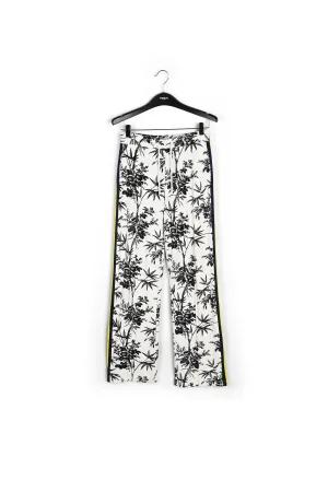 Classic white tracksuit pants with black print