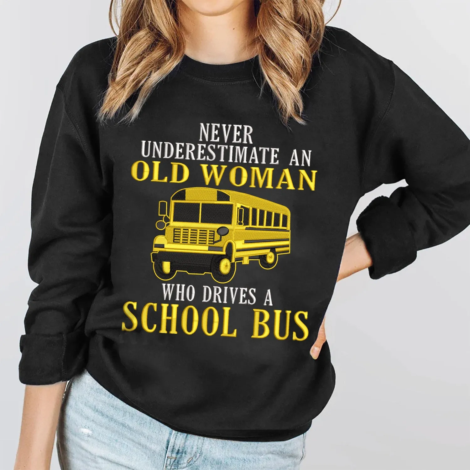 Never Underestimate An Old Woman Who Drives A School Bus Embroidered Sweatshirt - Embroidered Hoodie Tad