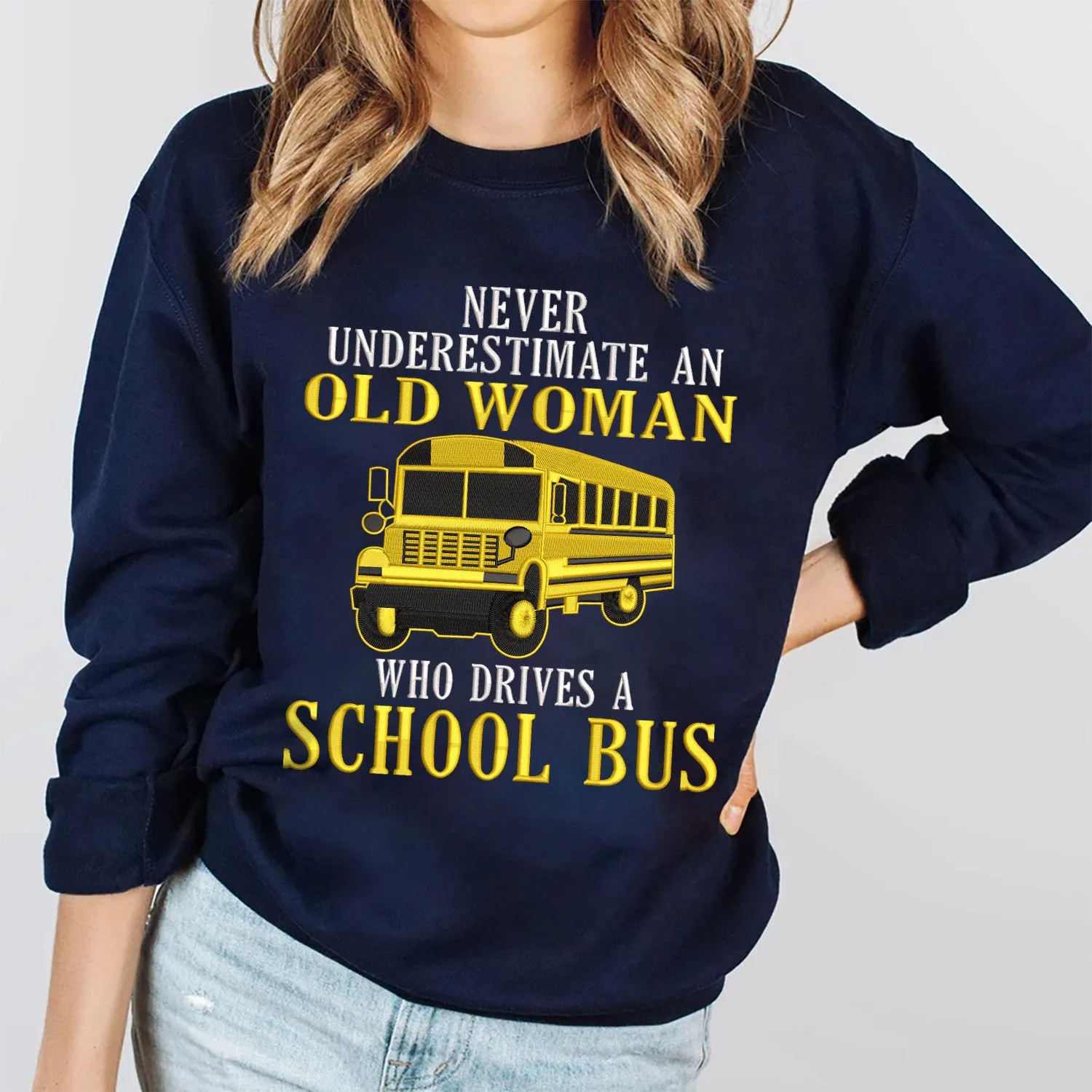Never Underestimate An Old Woman Who Drives A School Bus Embroidered Sweatshirt - Embroidered Hoodie Tad
