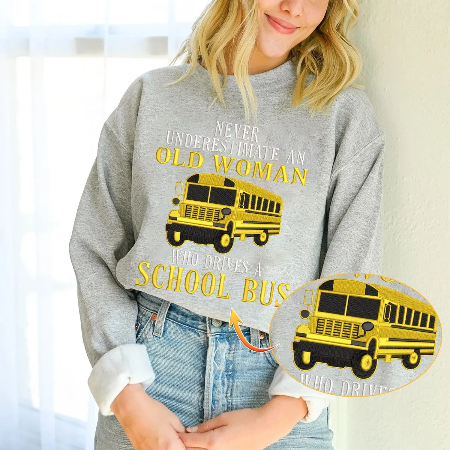 Never Underestimate An Old Woman Who Drives A School Bus Embroidered Sweatshirt - Embroidered Hoodie Tad